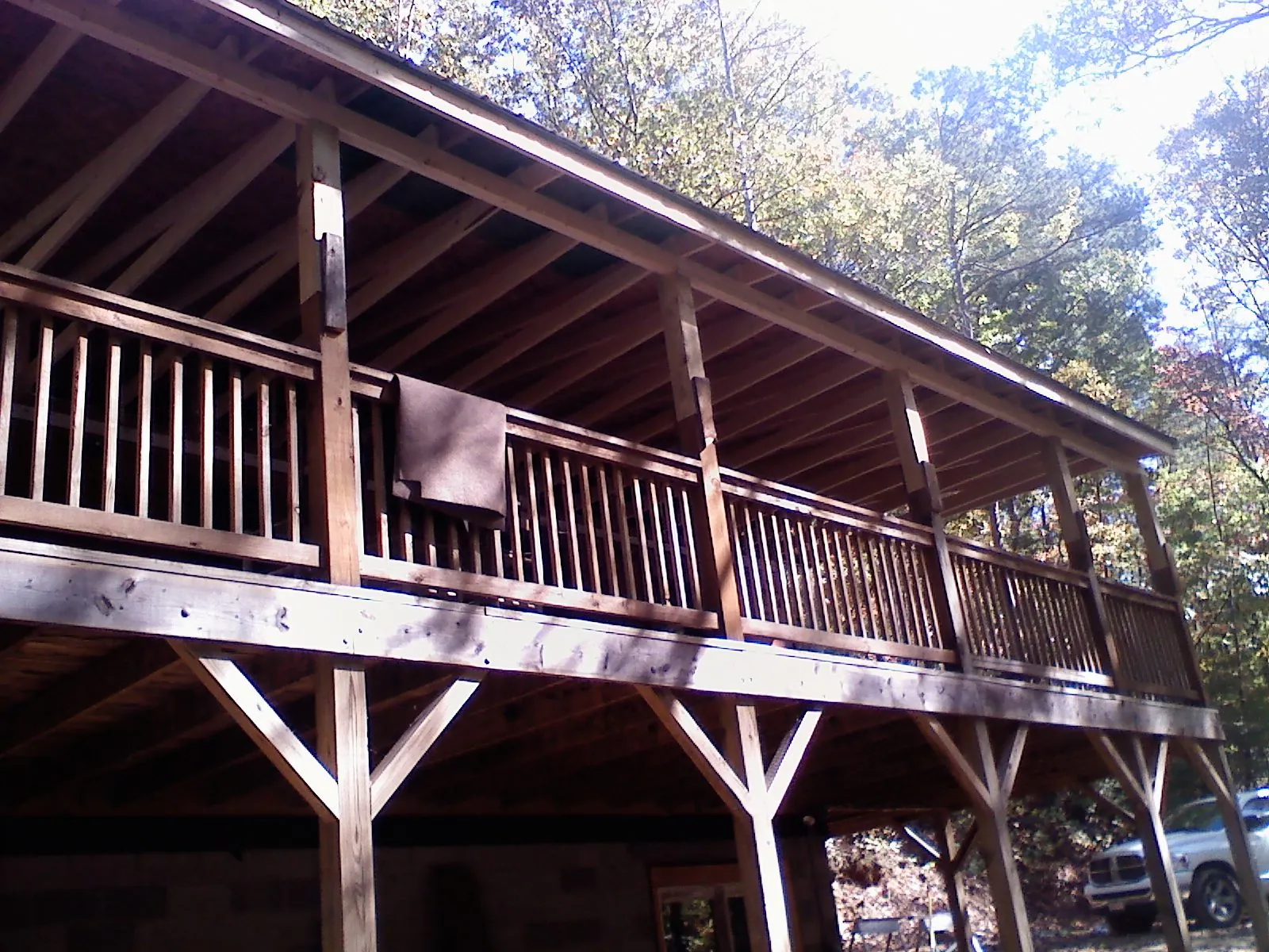 Timber framing under a new elevated porch and deck — Roof Leak Repair in Deforest by Roofing Brothers